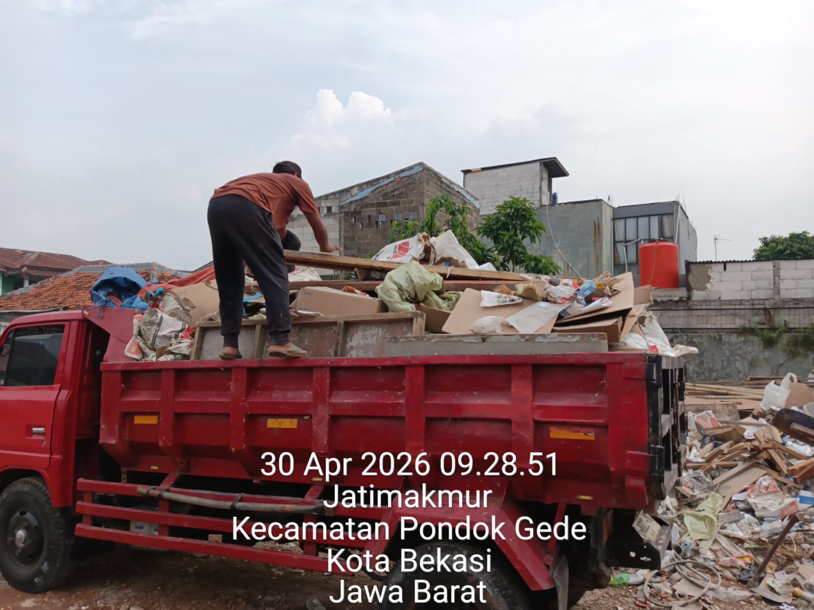 Angkut Puing